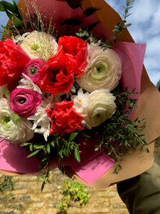 Spring flower Valentine bouquet: Red pink and a dash of white.